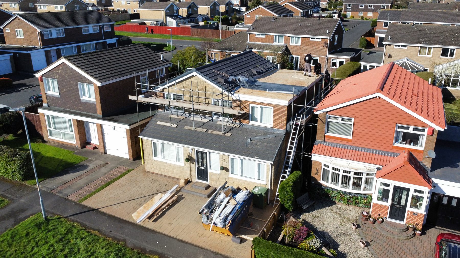 A roofing job in progress, photographed from above